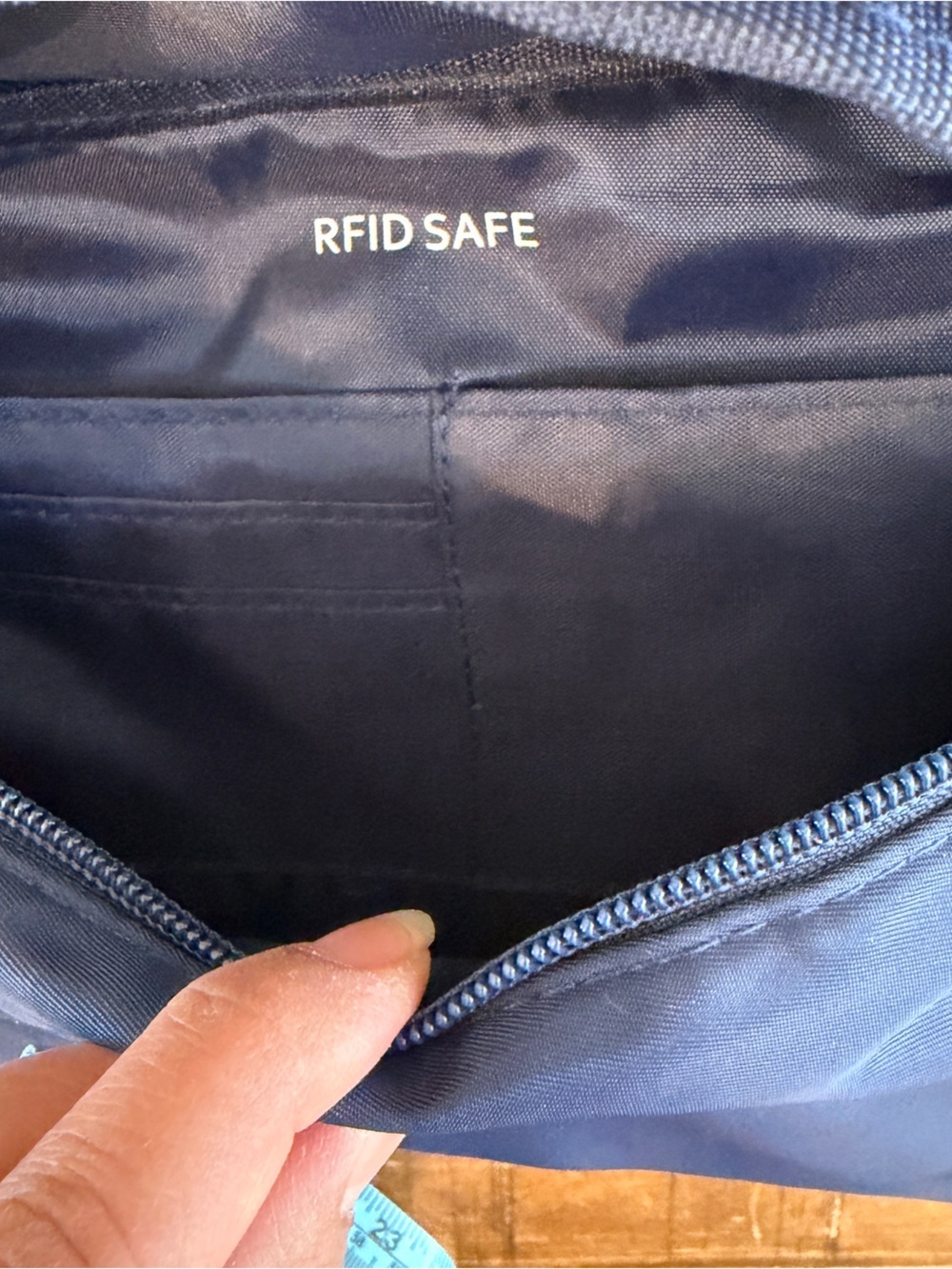 NWOT The Foldie Crossbody Bag in Navy Blue RFID Blocking - Picture 6 of 10